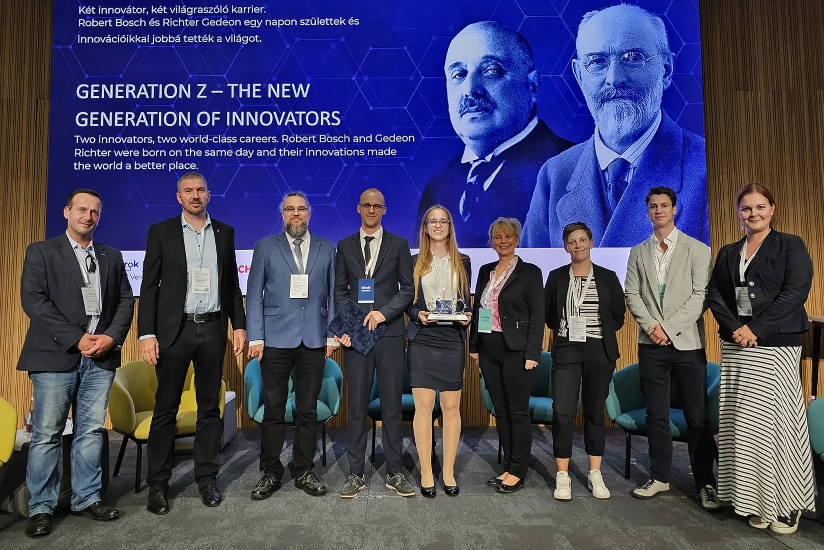 Two award-winning students of Széchenyi István University, Balázs Szőnyi and Fanni Lőrincz (fourth and fifth from left) with representatives of the Institution at the award ceremony.