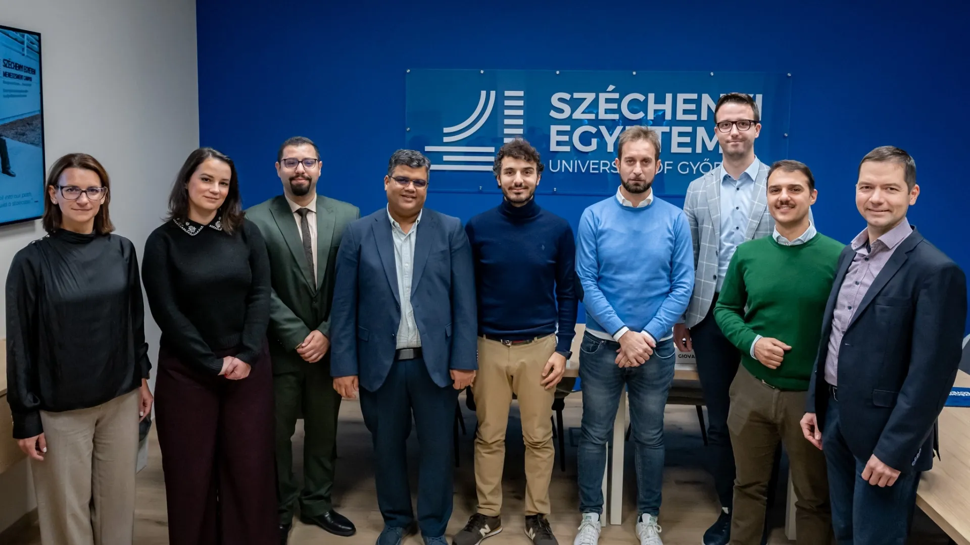 Participants of the meeting held at Széchenyi István University: Zsuzsanna Iharos (Digital Development Centre), Marcella Telek (Head, Centre for International Communication and Alumni), Milad Shafaie (doctoral student), Professor Majid Movahedi Rad (Vice-Dean for Scientific Affairs, Faculty of Architecture, Civil Engineering and Transport Sciences), Dr Francesco Giuseppe Martire and Dr Alberto Salvicchi (research physicians, University of Siena), Péter Németh (Scientific Secretary and Head of the HUN-REN University Centre of International Excellence), Dr Giovanni Tasso (research physician, University of Siena) and Dr Péter Törzsök (Vice-Dean for International Affairs, Faculty of Health and Sports Sciences) (Photo: András Adorján)