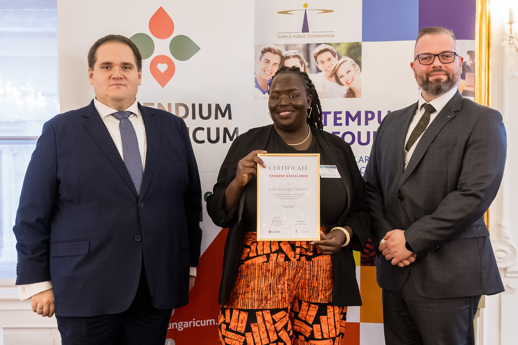 Juliet Adongo Omondi received the award from Dr Ádám Imre Szűcs, Deputy State Secretary of the Ministry of Foreign Affairs and Trade, and Richárd Bodrogi, Director General of the Tempus Public Foundation
