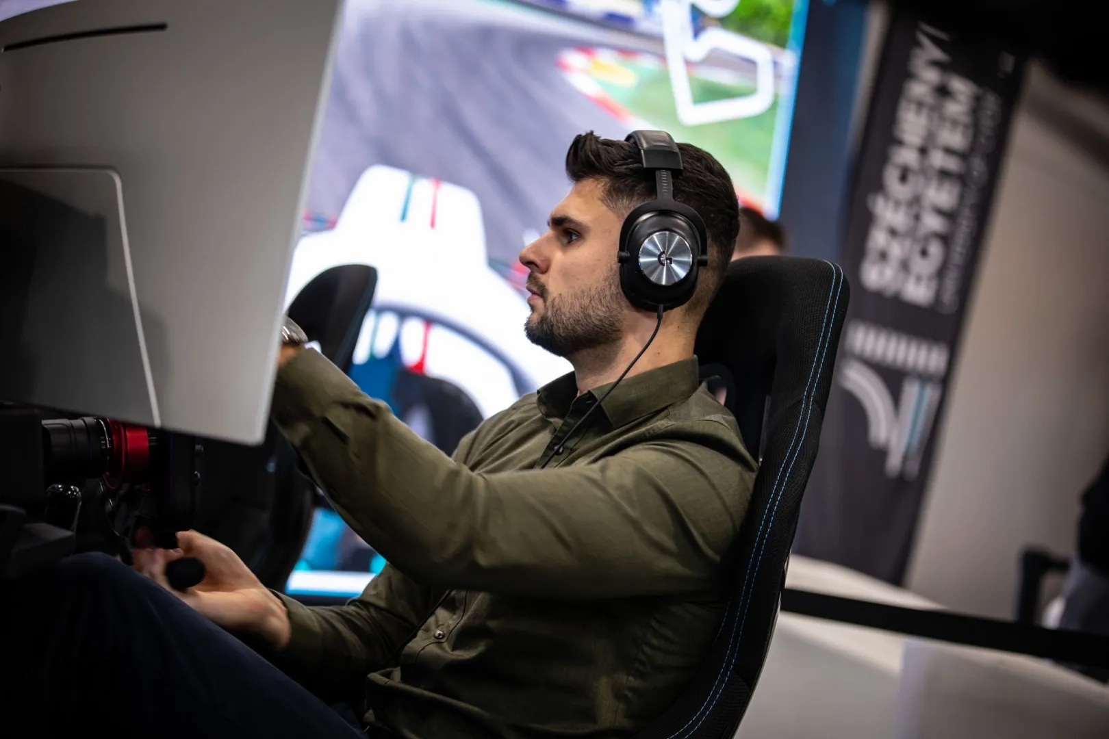 More than a thousand visitors tried the simulators at the University’s PlayIT stand, including racing driver and commentator Dani Nagy (Photo: Márta Bóta)