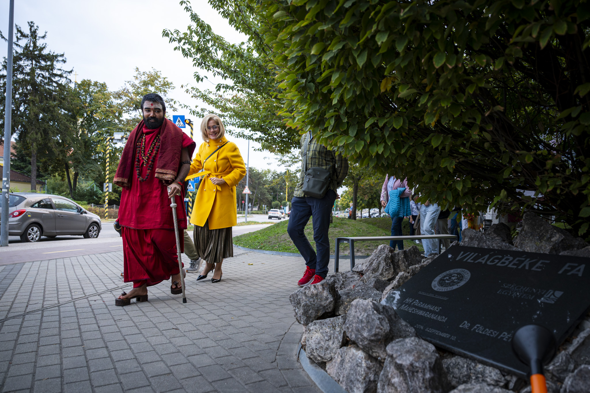 The visit concluded with the watering of the peace tree planted in front of the University Library in 2014 by Mahamandaleshwar Paramhans Swami Maheshwarananda, founder of the Yoga in Daily Life system, and University leaders. (Photos: Máté Dudás) The visit concluded with the watering of the peace tree planted in front of the University Library in 2014 by Mahamandaleshwar Paramhans Swami Maheshwarananda, founder of the Yoga in Daily Life system, and University leaders. (Photos: Máté Dudás)